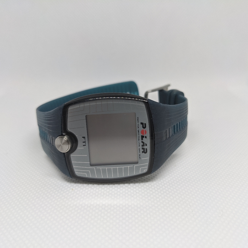 Polar Fit turquoise plastic band watch